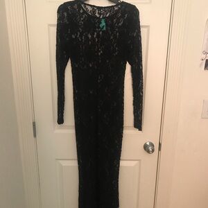 New with tag. Full length black lace dress.